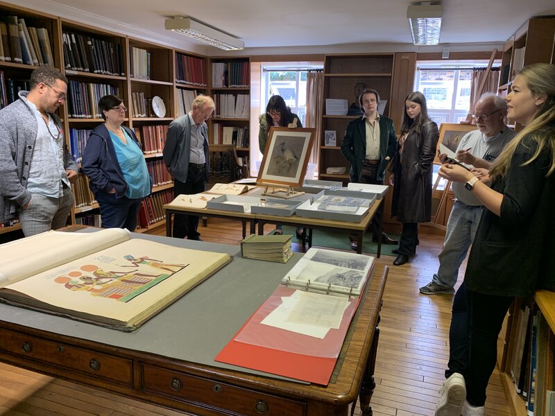 EES Collections Manager Stephanie Boonstra (right) giving a tour of archive material in the library.