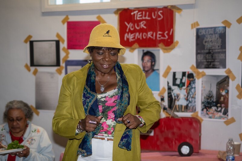 Woman dancing with archive materials in background 



(photo credit) Donna Travis