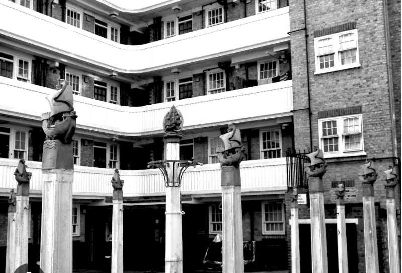 Gilbert Bayes' finial sculptures in St Nicholas' Flats.