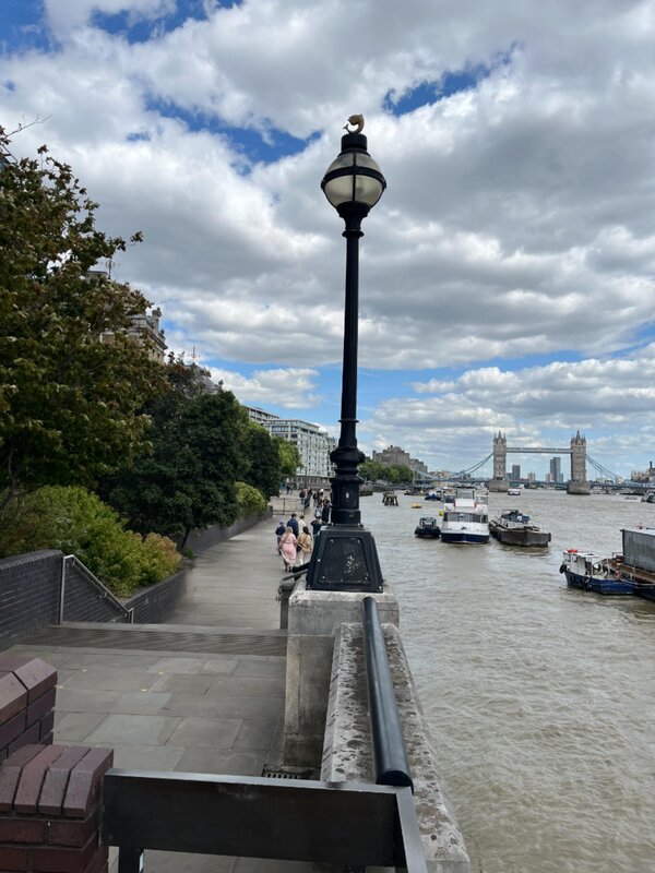 Thames path with Tower Bridge in distance