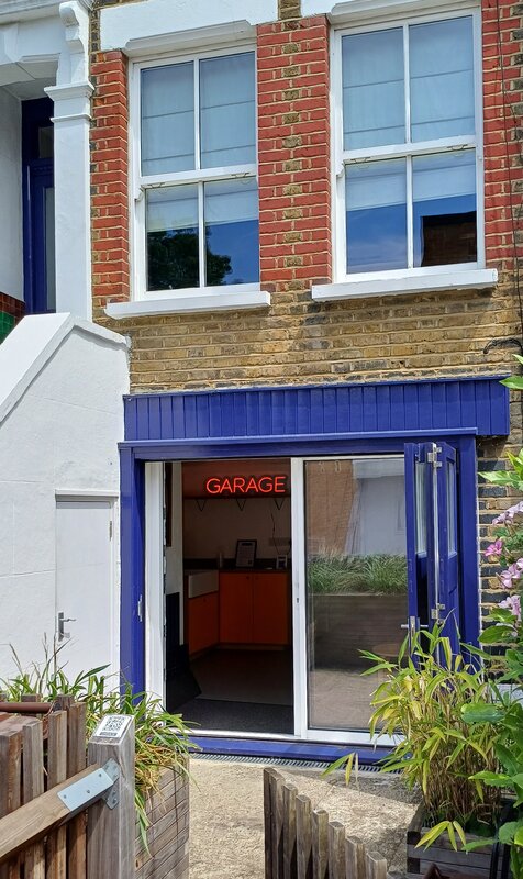 Garage Gallery and the house upstairs