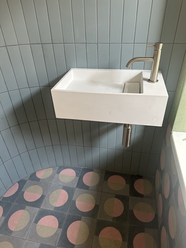 Bathroom in whole house retrofit with clay finish