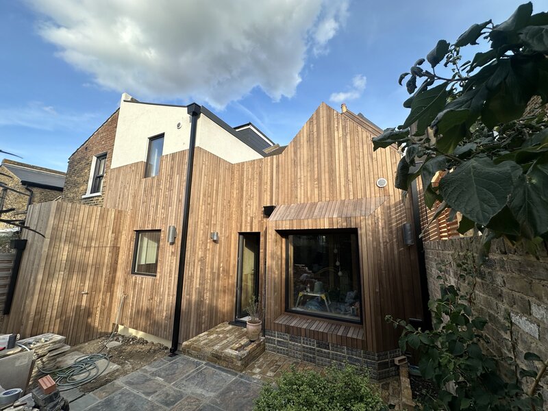 UK Brimstone ash finish to hemp and woodfibre low-carbon insulated extension