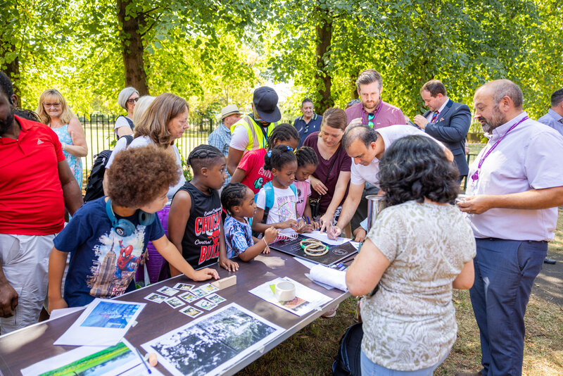 Children enjoying the time capsule and centenary event in August 2025