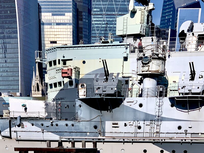 HMS Belfast against a City backdrop. Photo @meetmrlondoner