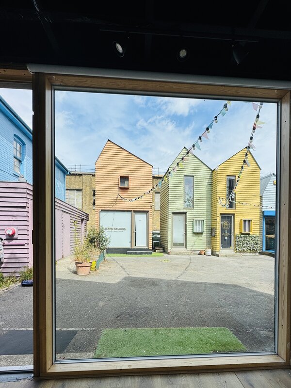 View of Blue House Yard from Birch Arts gallery